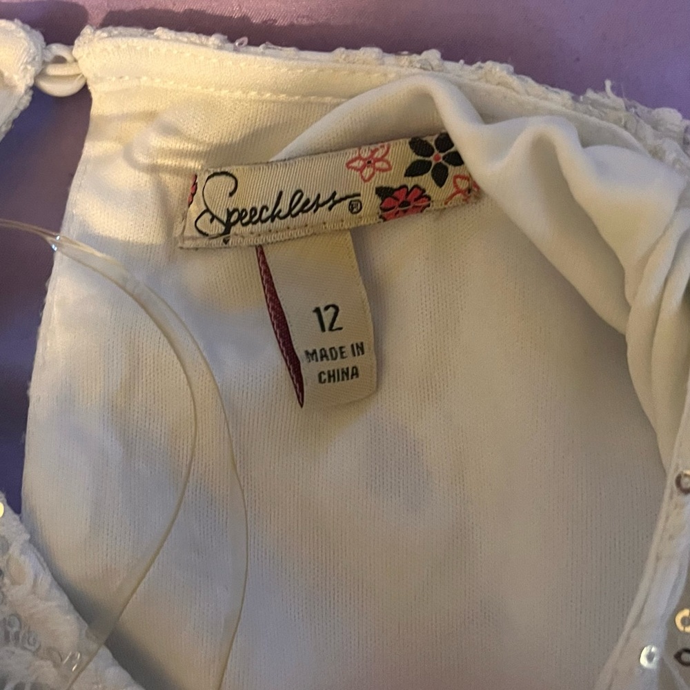 Wore to a 5-6th grade party years ago ,cute for a little one (12)
